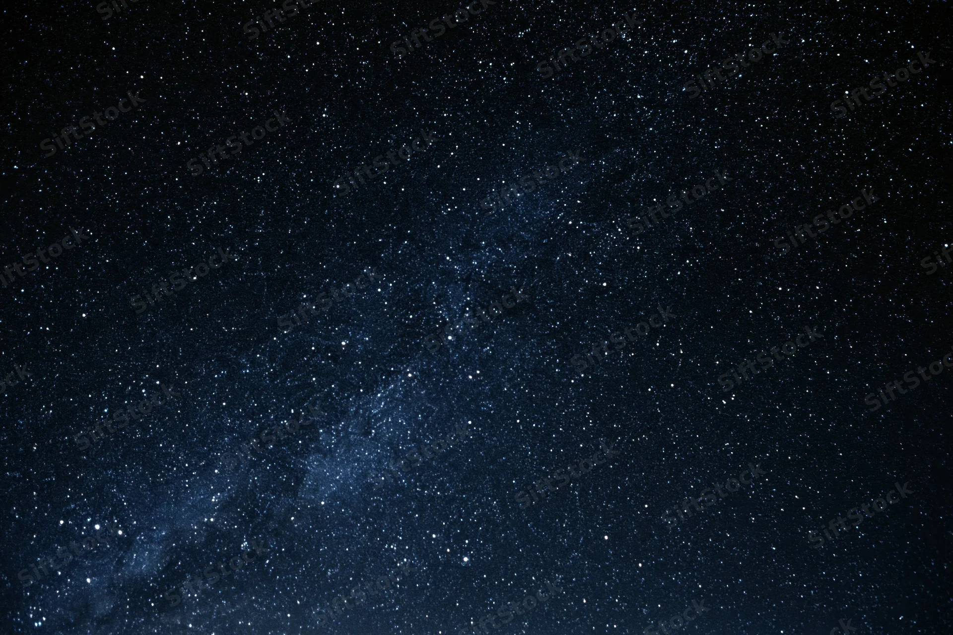 Clear night sky with scattered stars and visible milky way