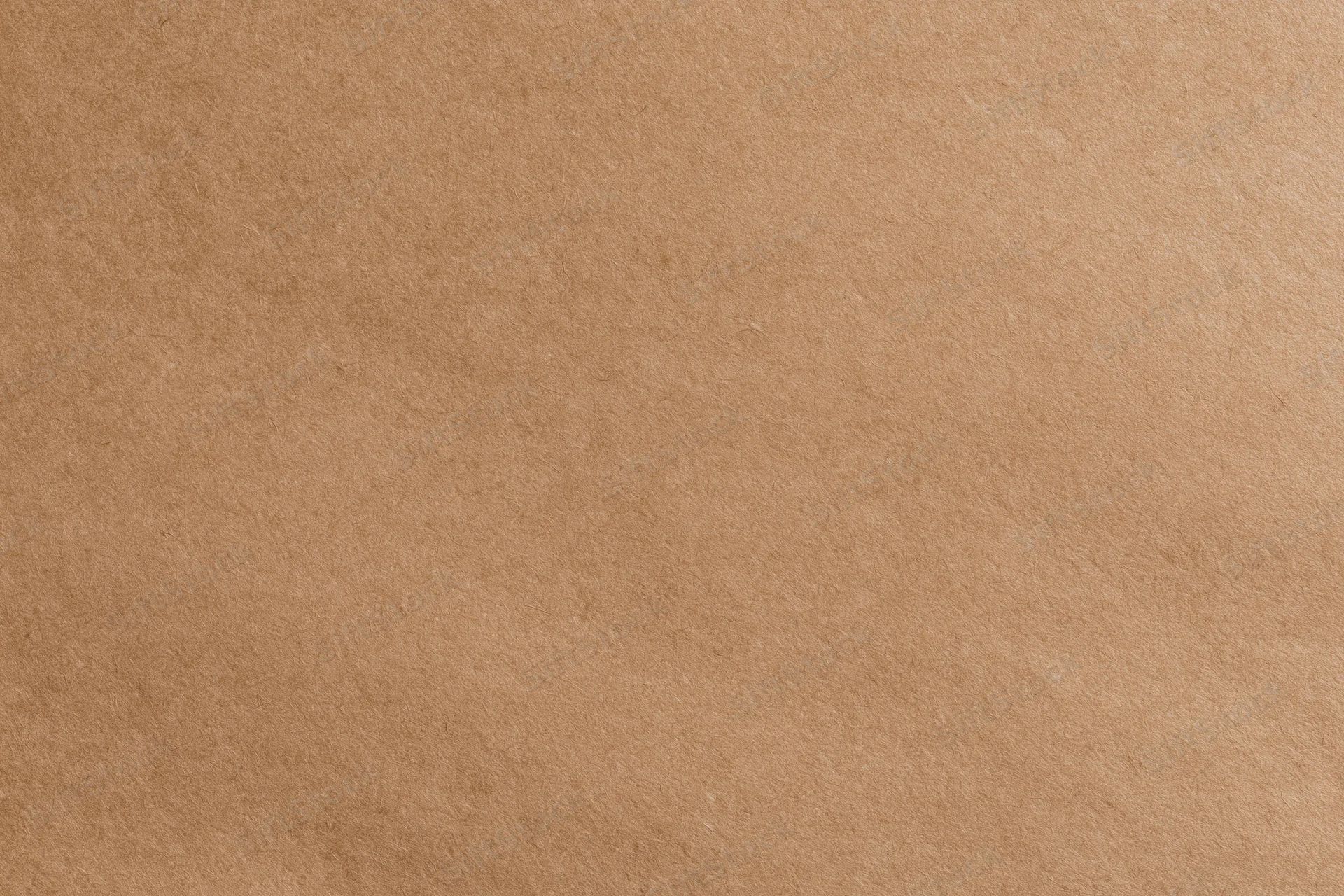 Close-up flat lay of smooth matte brown kraft paper surface