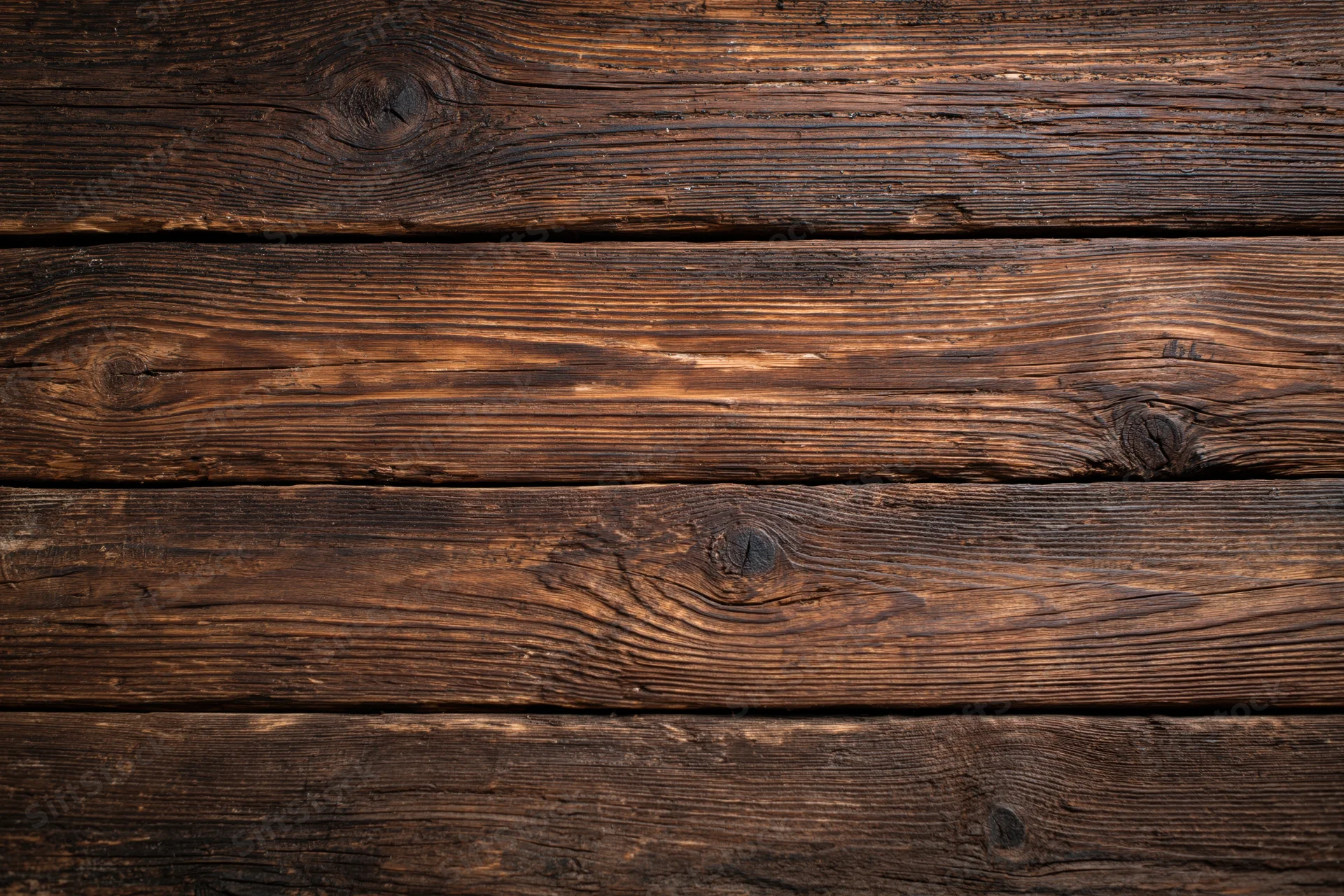 Close-up of aged horizontal wooden planks showing natural grain and texture
