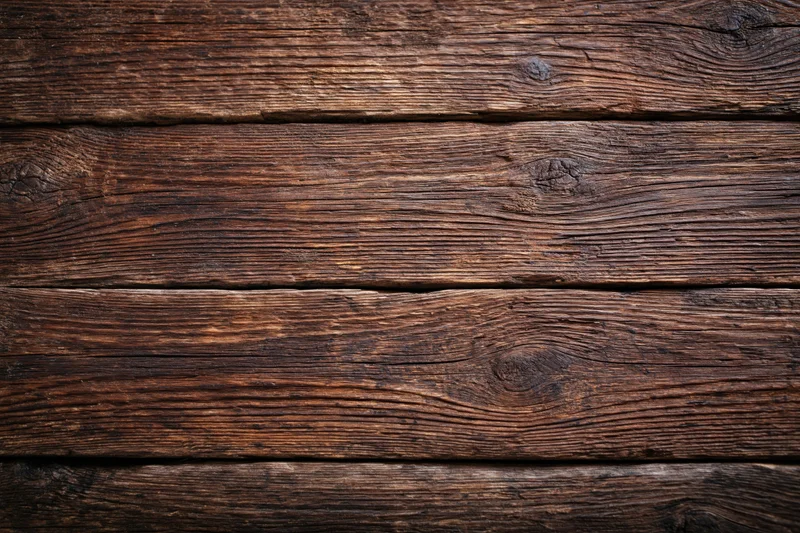 Close-up of aged horizontal wooden planks showing natural grain and weathered texture