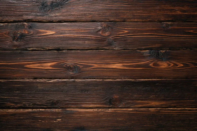 Dark stained horizontal wood planks forming a textured surface