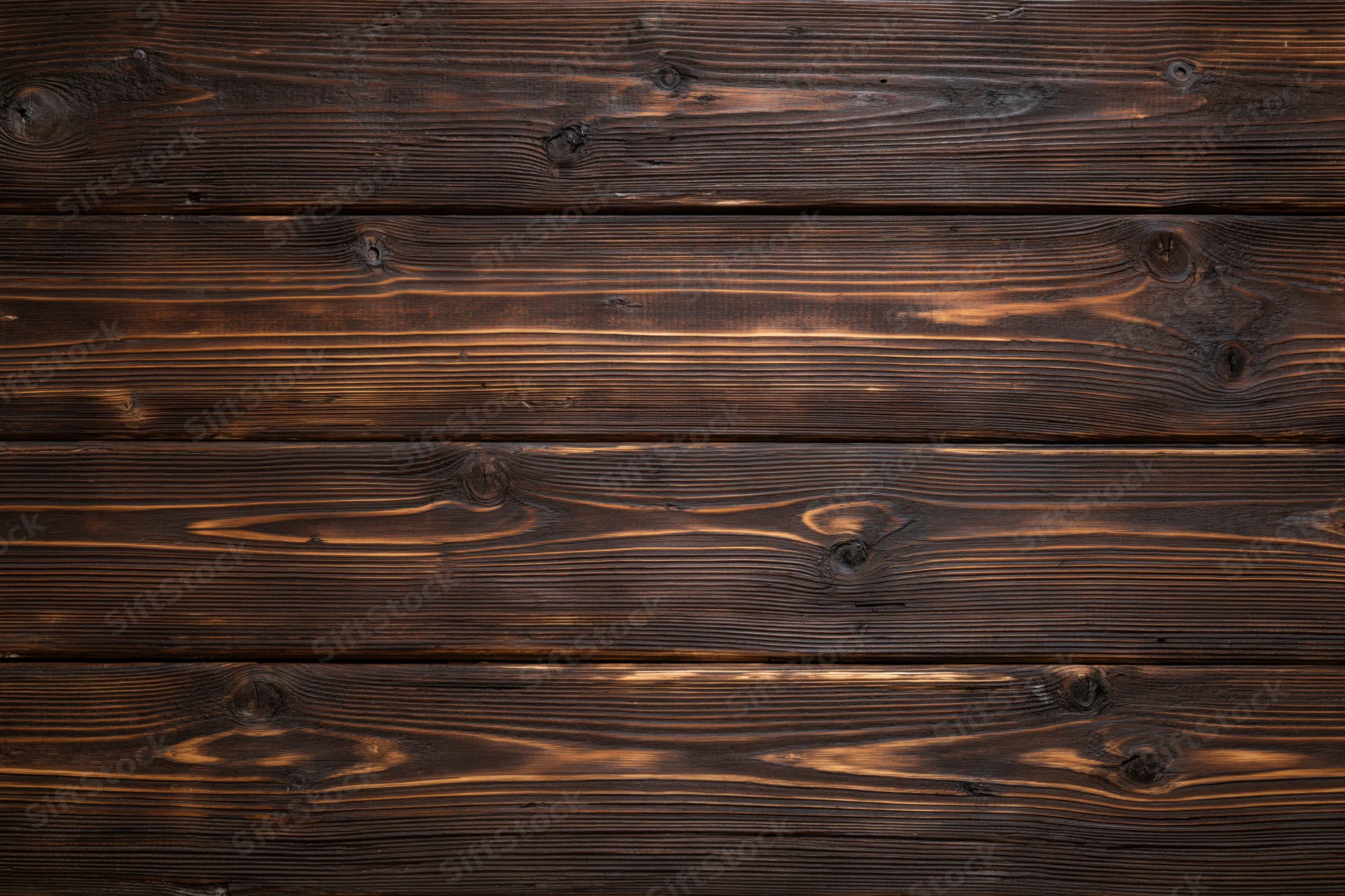 Dark stained horizontal wood planks forming a textured surface with visible grain and knots