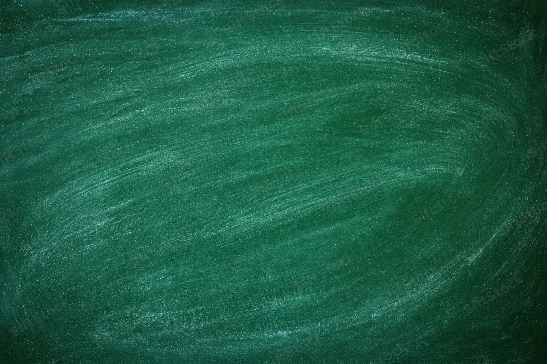 Close-up of blank green chalkboard surface with faint chalk marks and texture