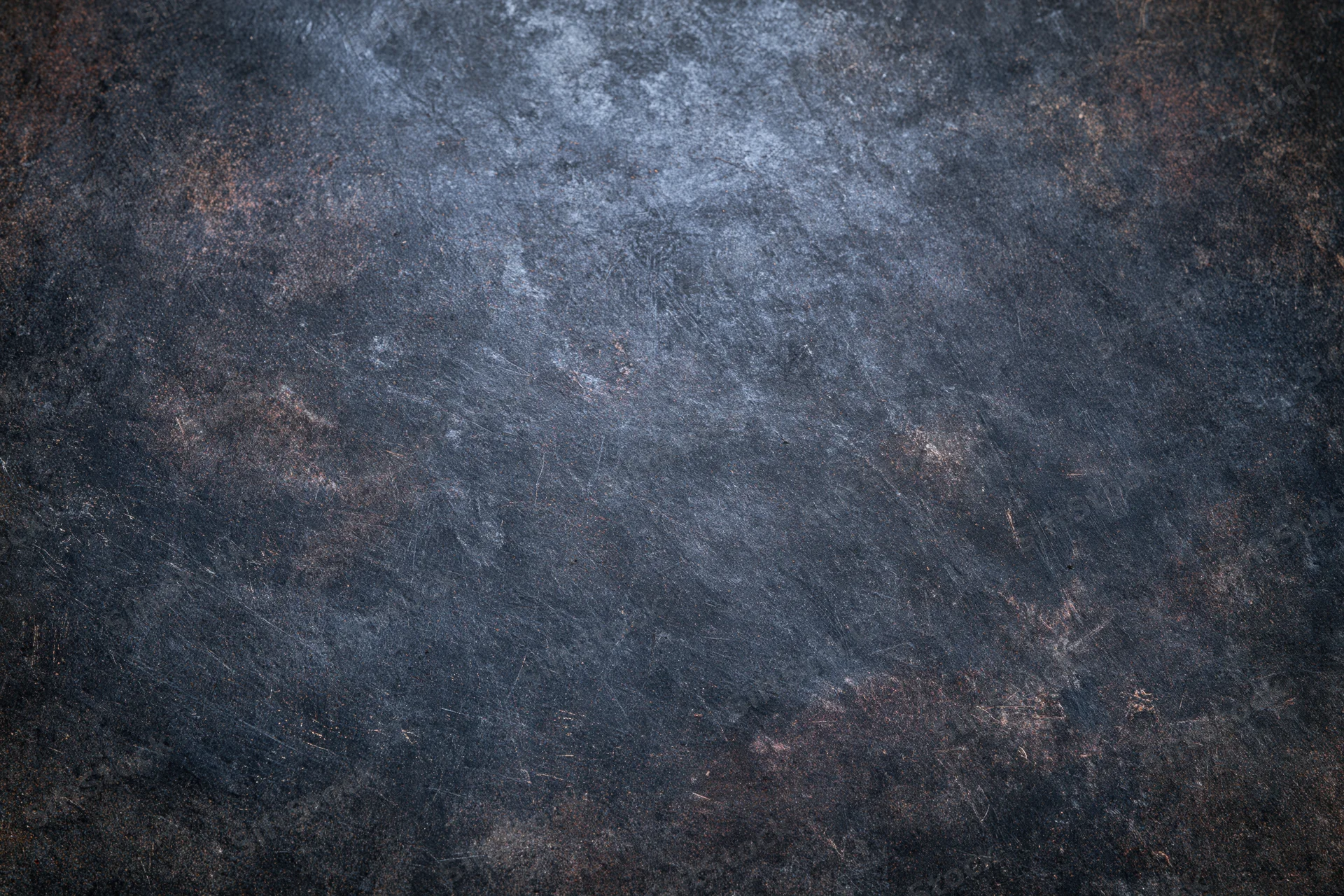 Close-up of a worn painted metal surface with rust and scratches
