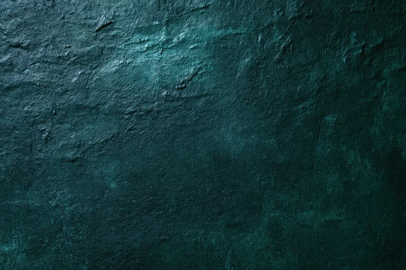 Close-up flat shot of an aged plaster or concrete wall surface