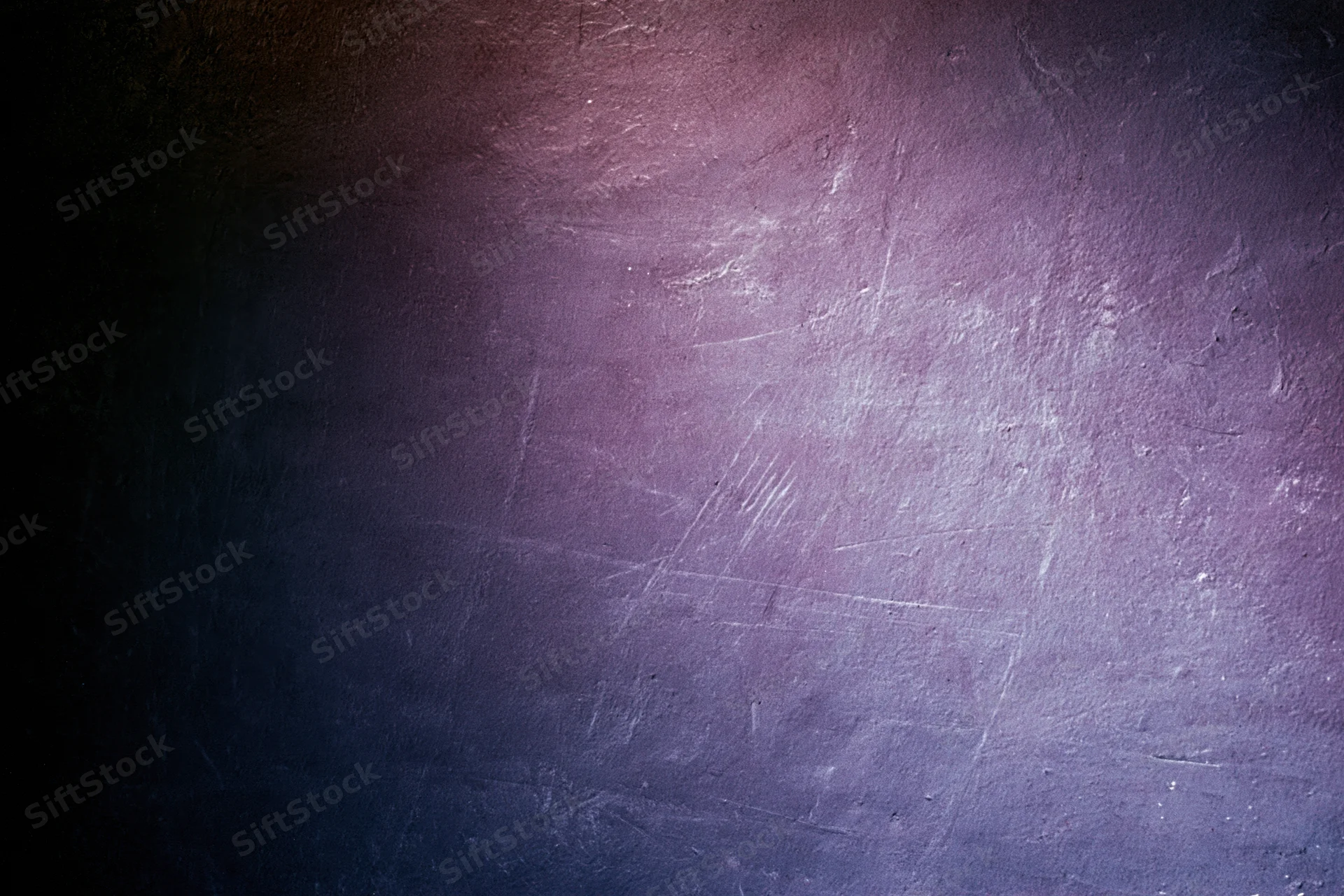 Close-up of a worn concrete wall surface with purple and blue gradient lighting