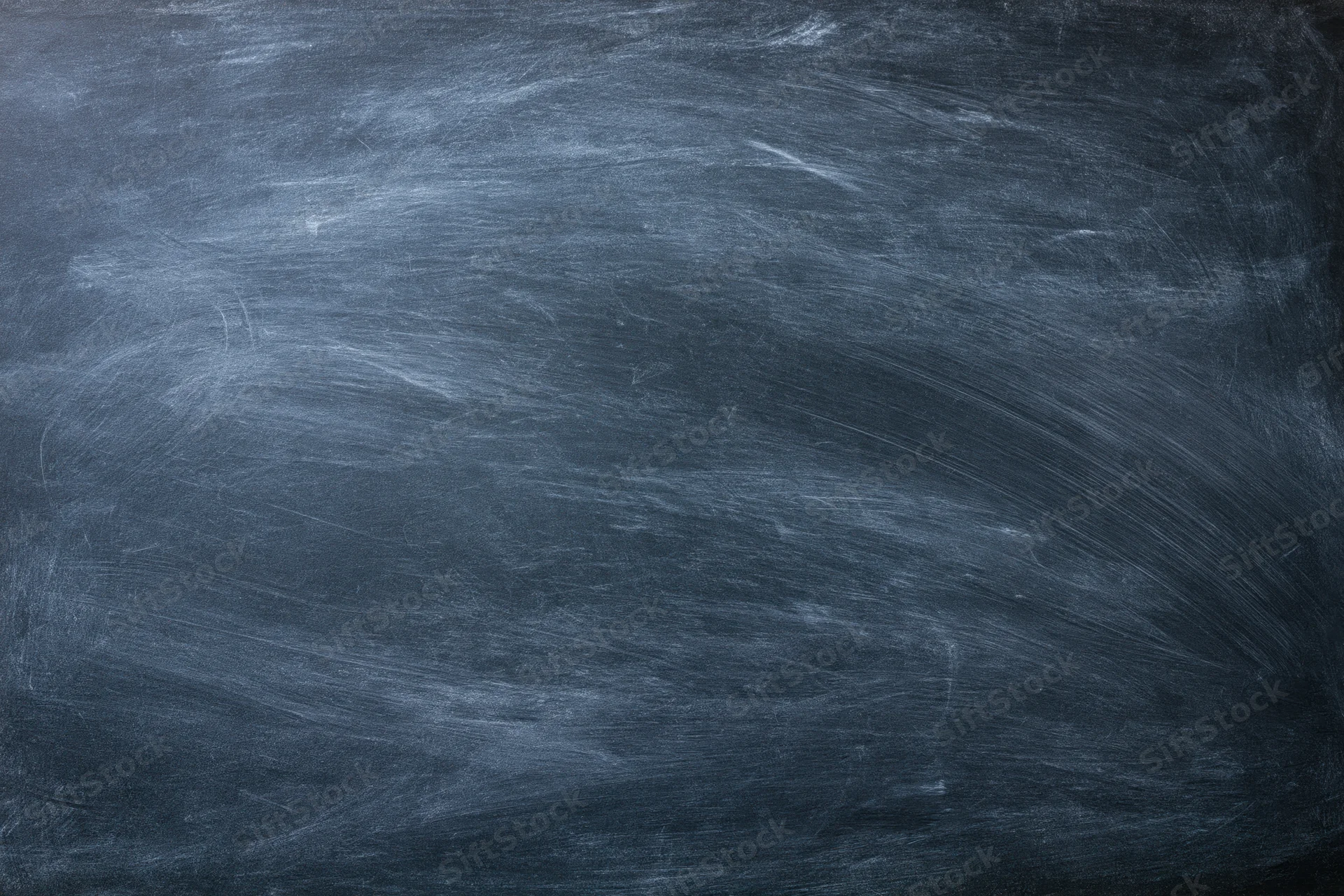 Dark slate chalkboard surface with faint erased chalk marks and smudges, showing texture and residue from use