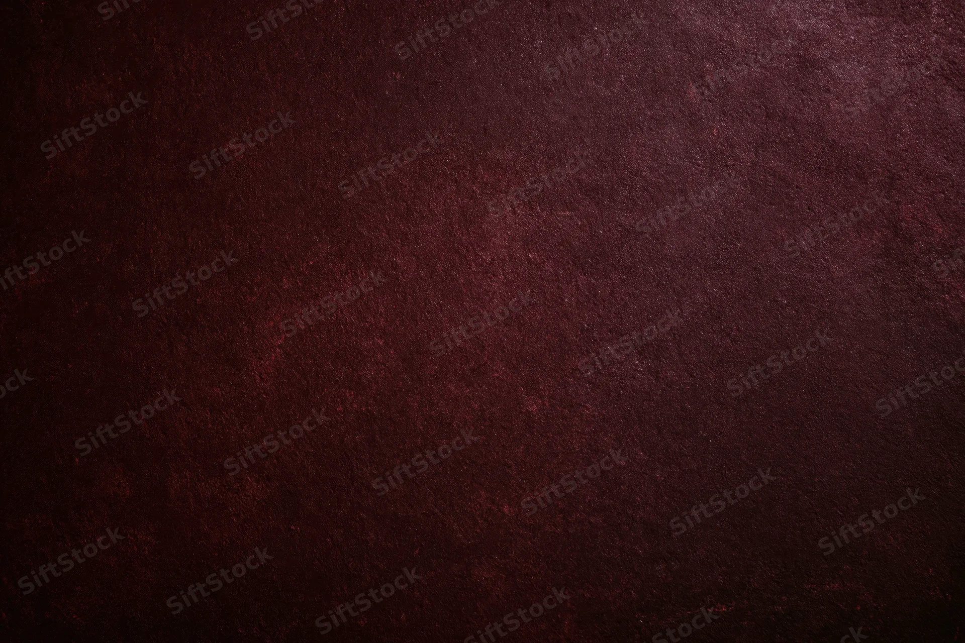 Deep dark maroon textured background with subtle grain and shadow variation