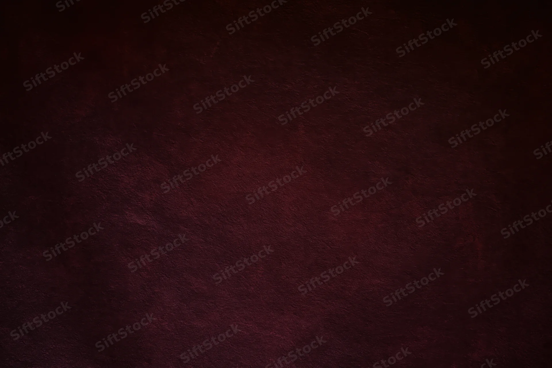 Deep dark maroon textured background with subtle gradient and warm tone