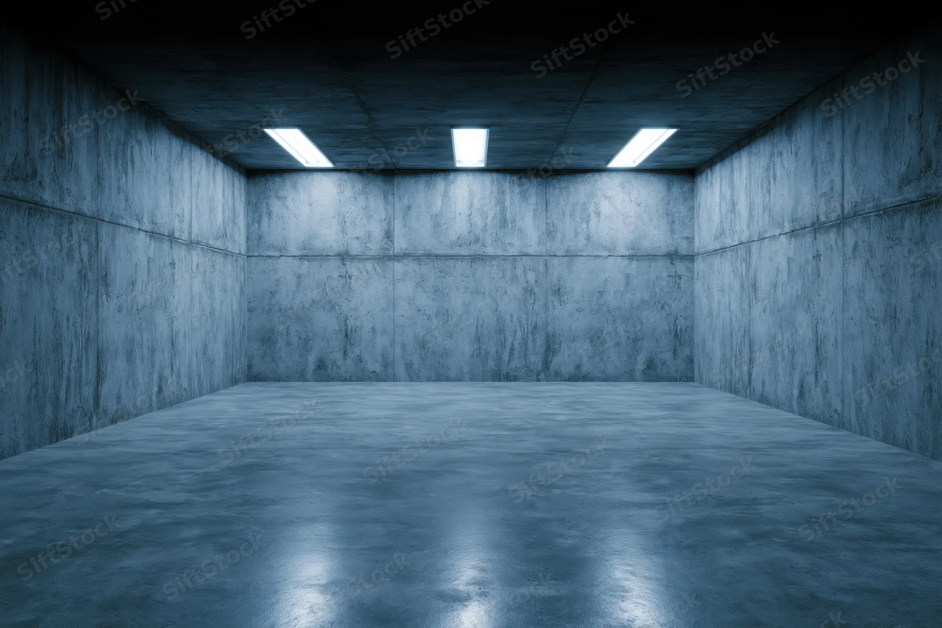 Empty concrete room with polished floor and fluorescent ceiling lights