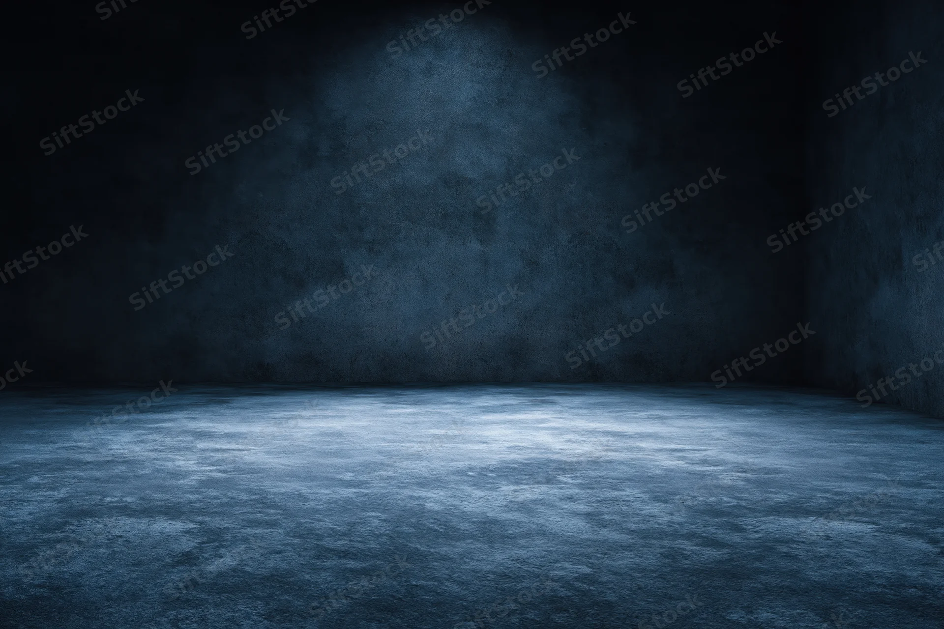 Empty dark concrete room interior with spotlight on wall and floor