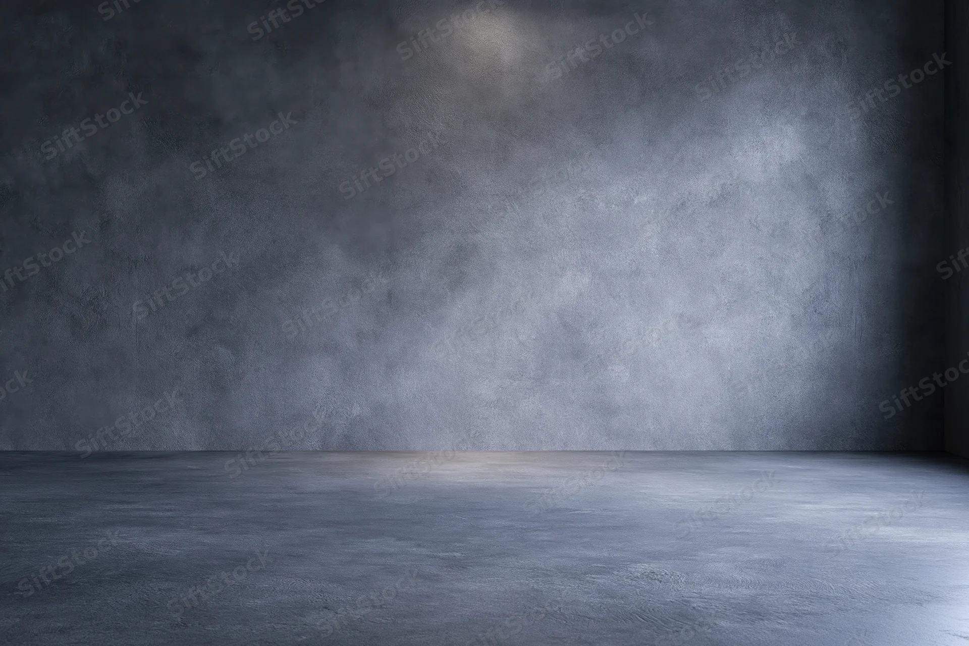 Empty dark grey concrete studio with smooth floor and textured walls