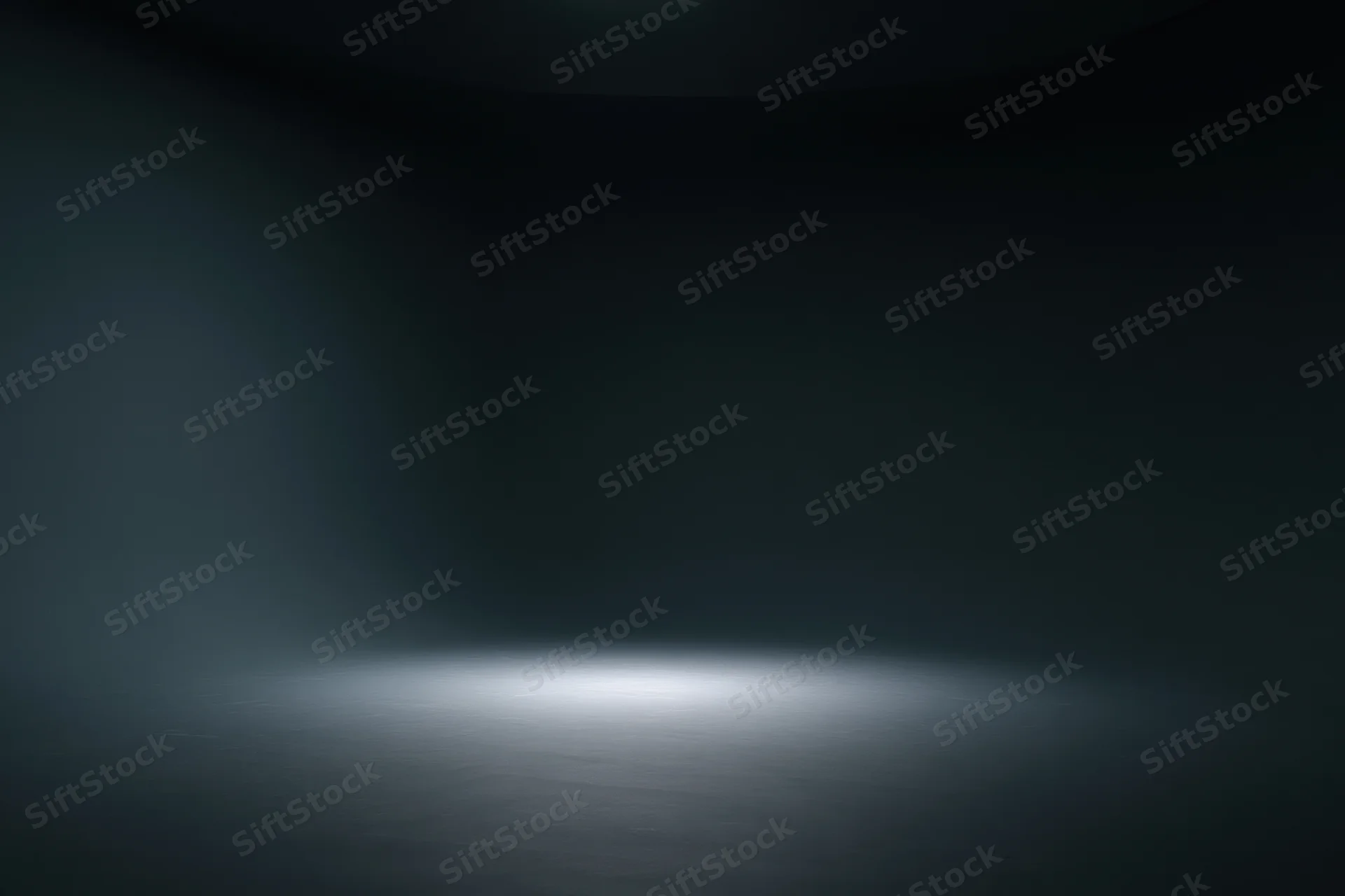 Dark empty studio space with spotlight on seamless floor surface