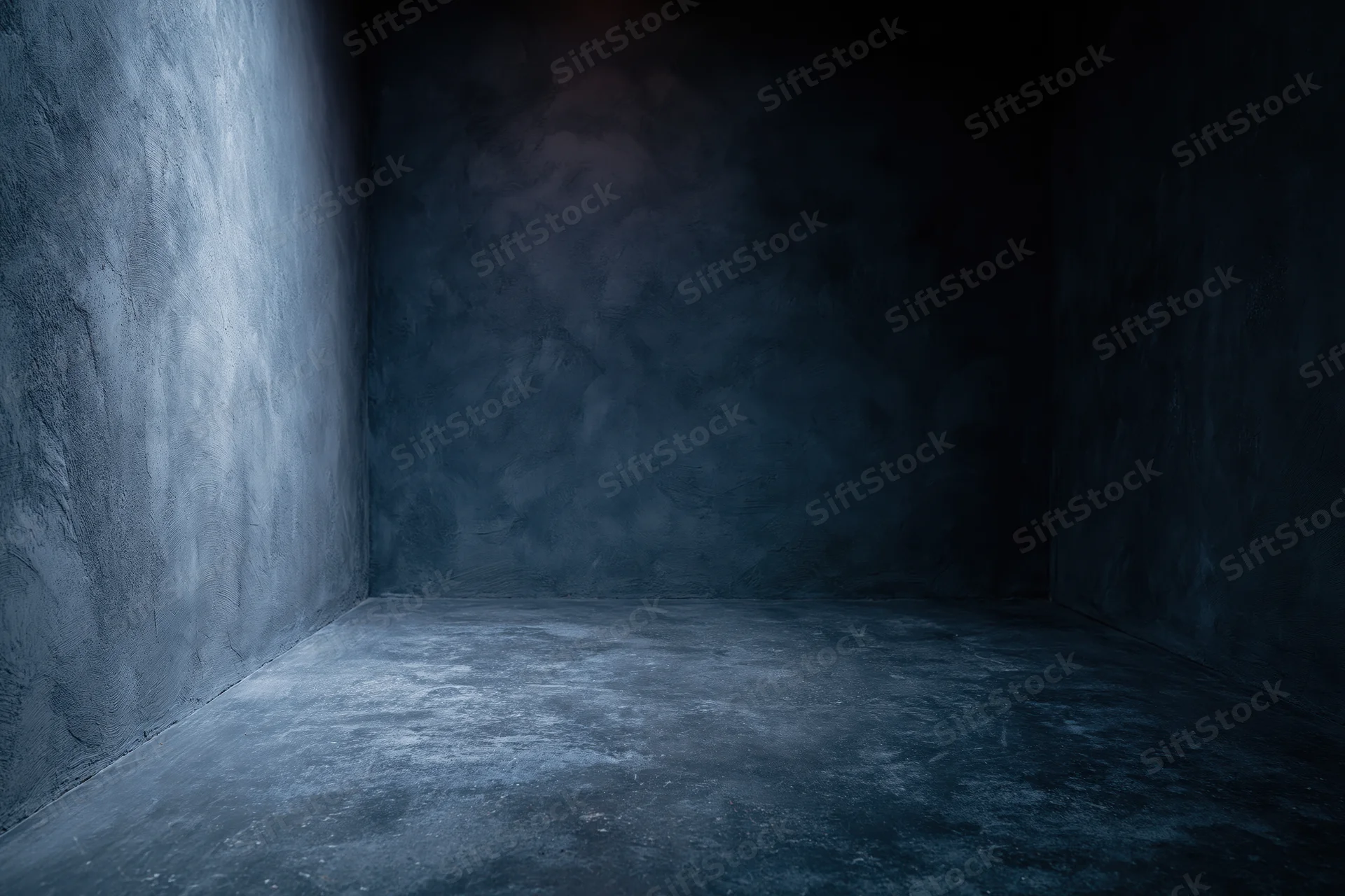 Dark empty studio corner with textured concrete walls and floor