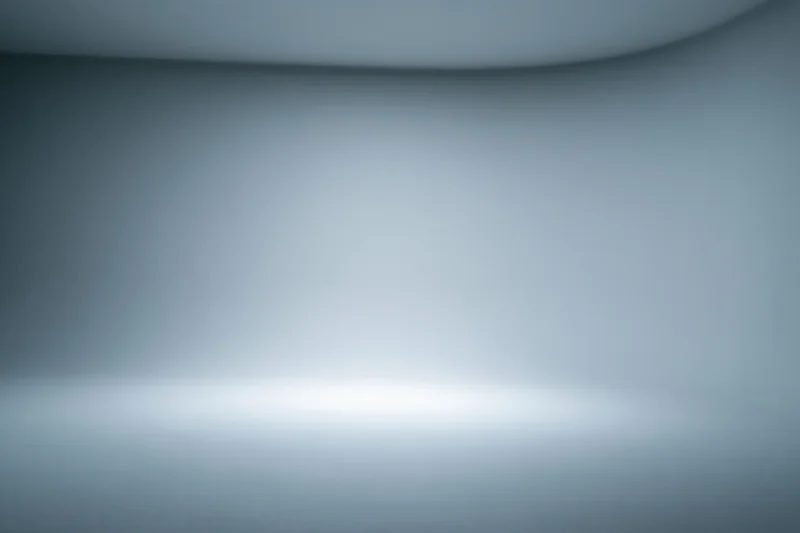 Smooth seamless grey backdrop in a professional photo studio space