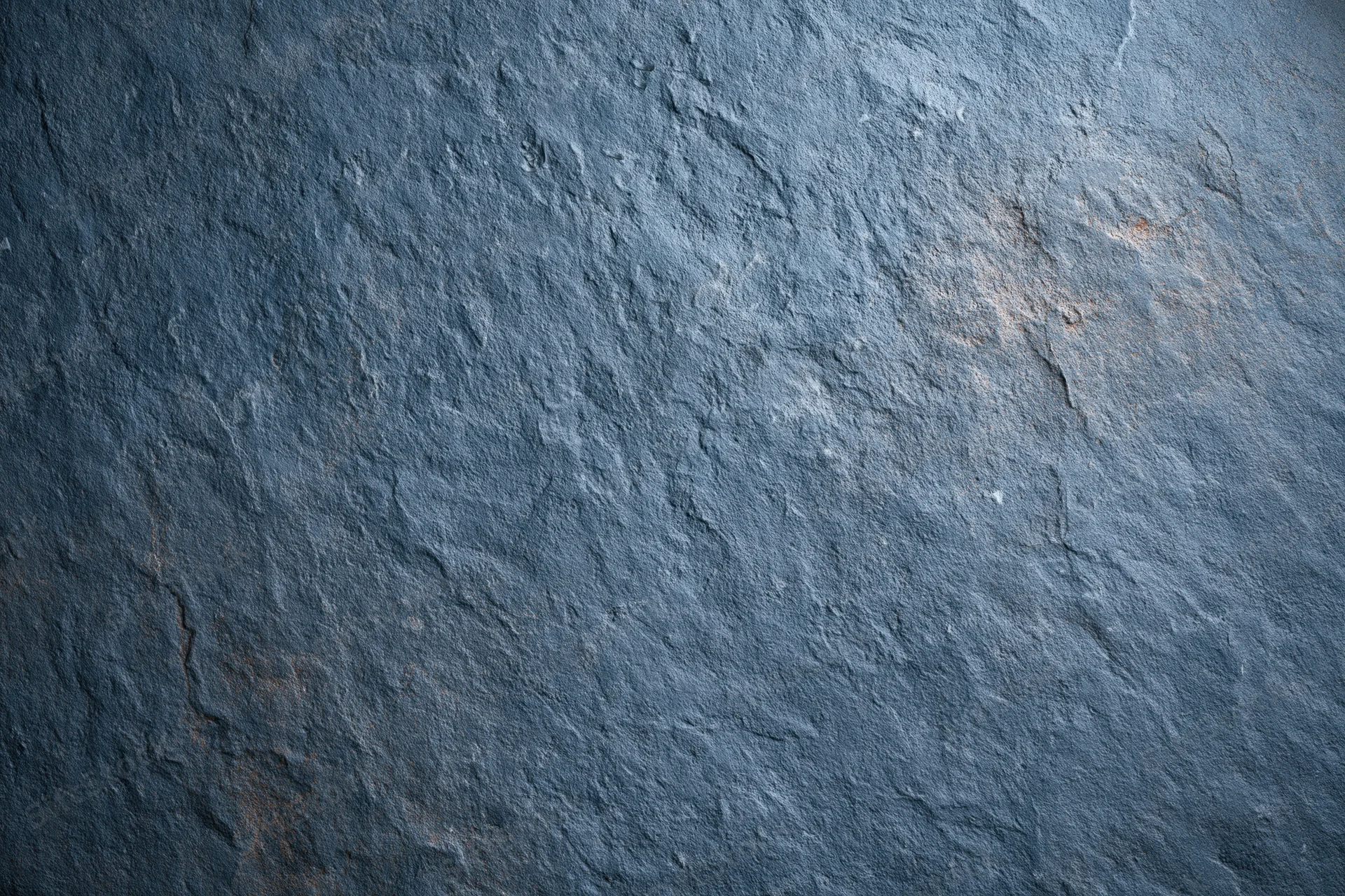 Textured concrete wall surface filling the frame