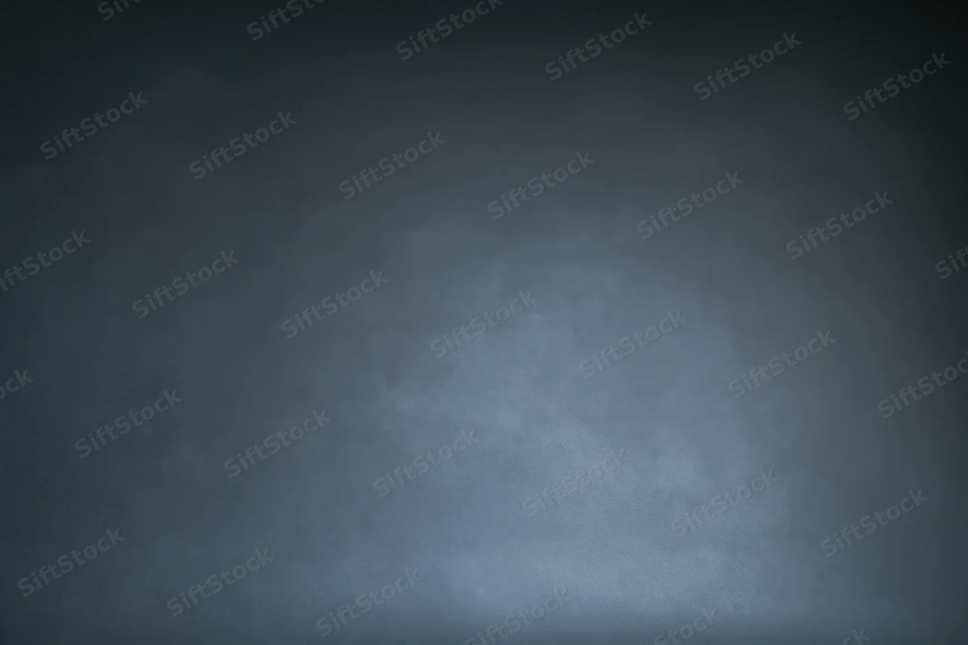 Dark grey gradient background with smooth matte texture