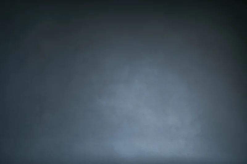 Dark grey gradient background with smooth matte texture