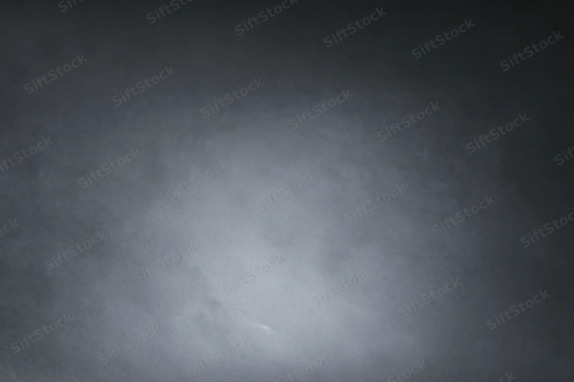Dark grey gradient background with smooth matte texture and soft light variation