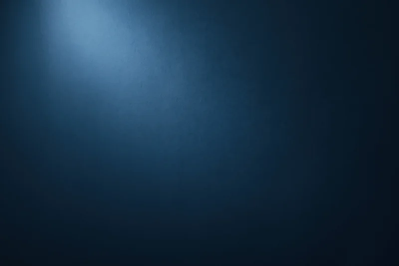 Dark navy blue gradient background with smooth matte texture and soft lighting gradient