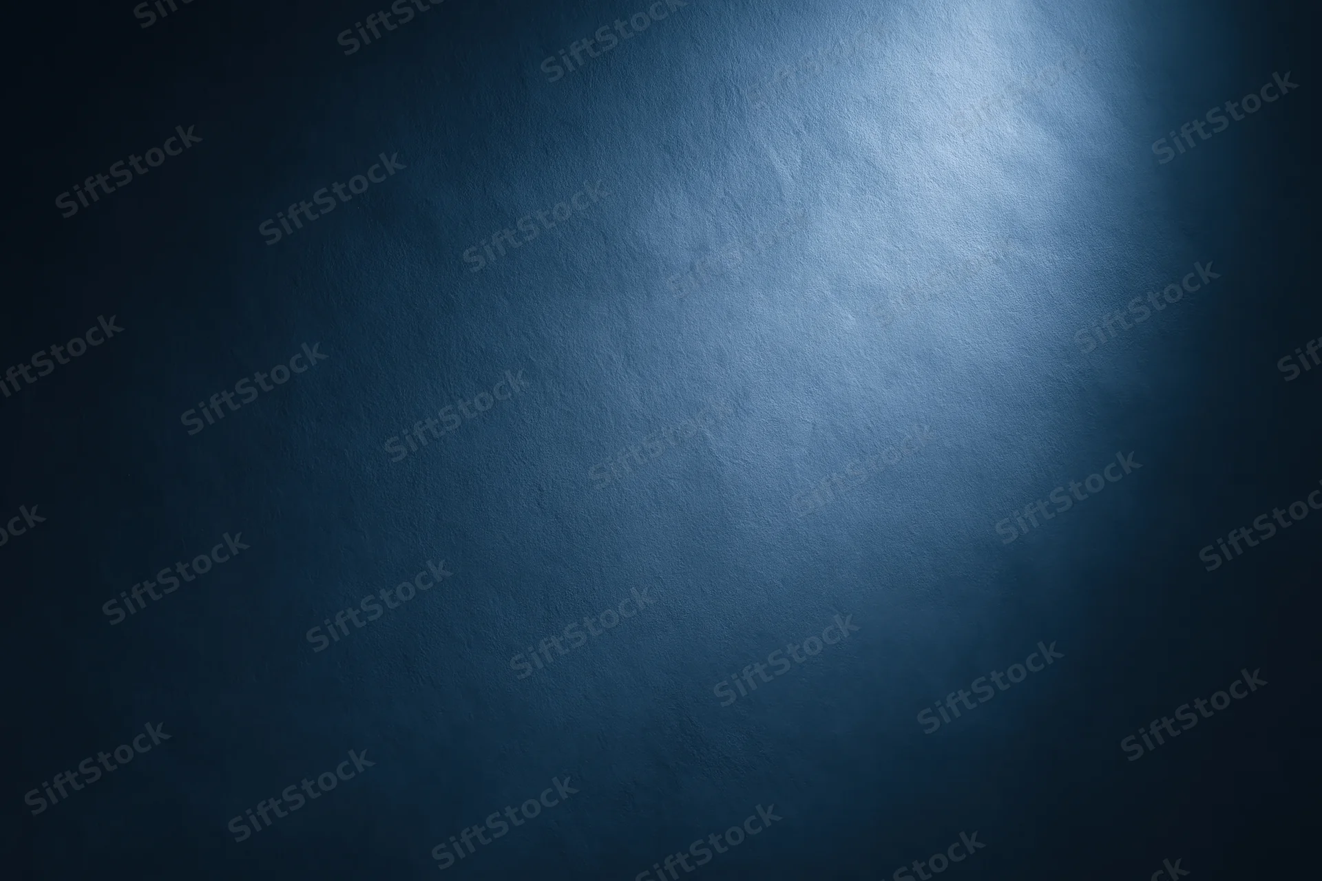 Dark navy blue gradient background with smooth matte texture and spotlight effect