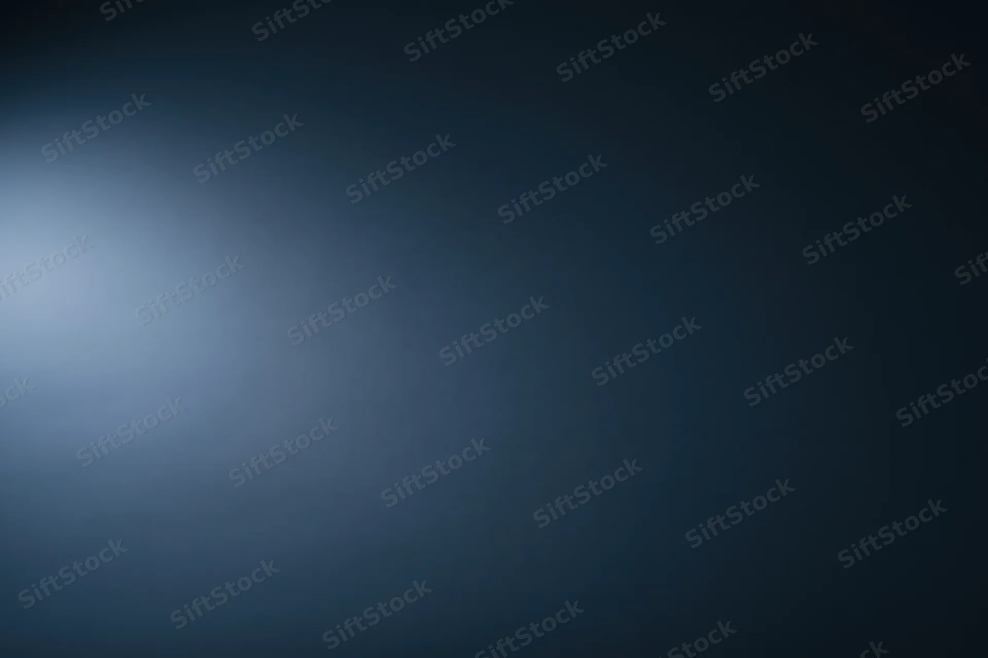 Dark navy blue gradient background with smooth matte surface and soft light transition