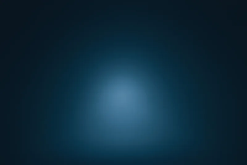 Smooth navy blue gradient background with soft light centered in the frame