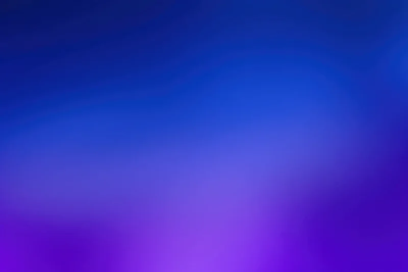 Smooth gradient transitioning from deep navy blue to purple across the frame