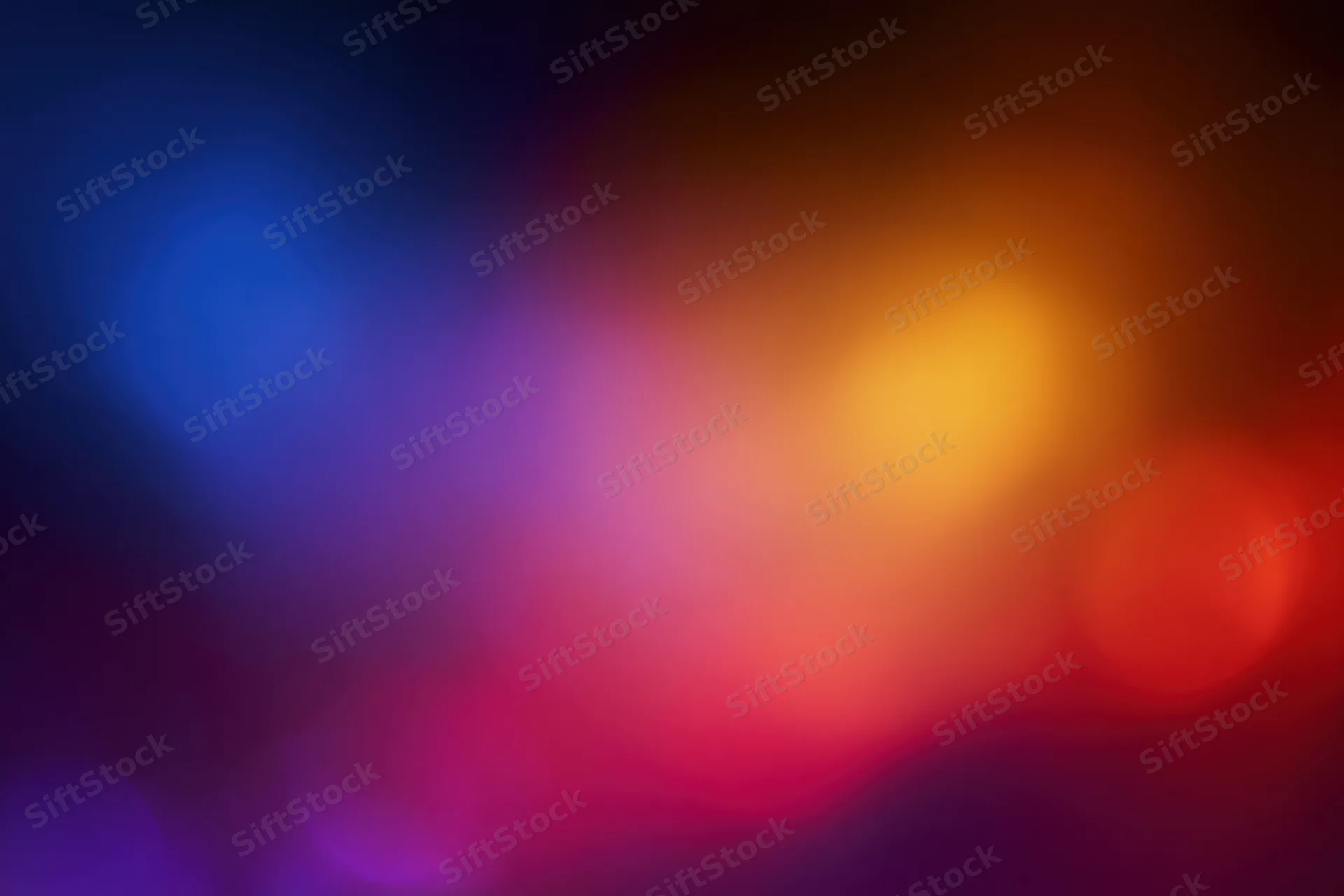 Soft out-of-focus bokeh background with blended warm and cool colors