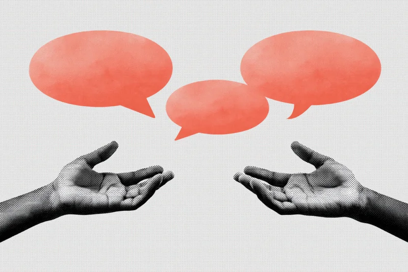 Two hands gesturing toward each other with red speech bubbles above them on a light grey background
