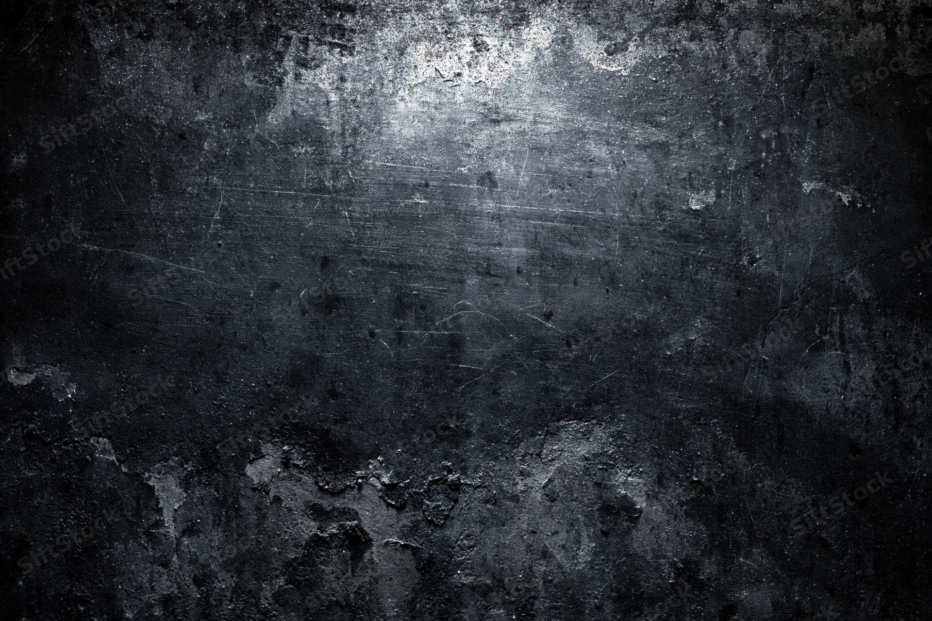 Weathered concrete wall surface with peeling paint and scratches