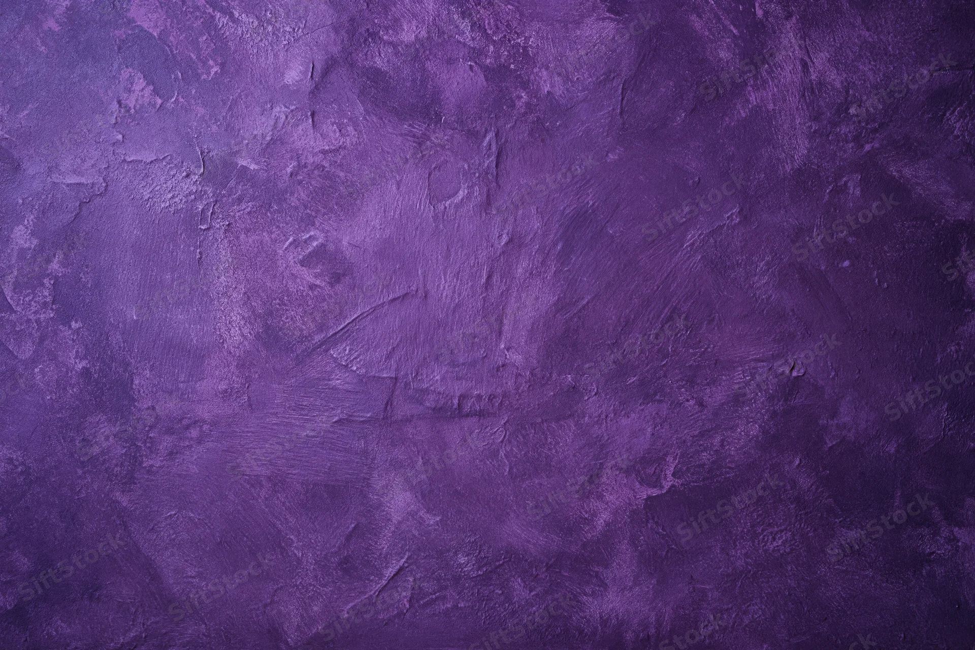 Weathered purple plaster wall surface filling the frame