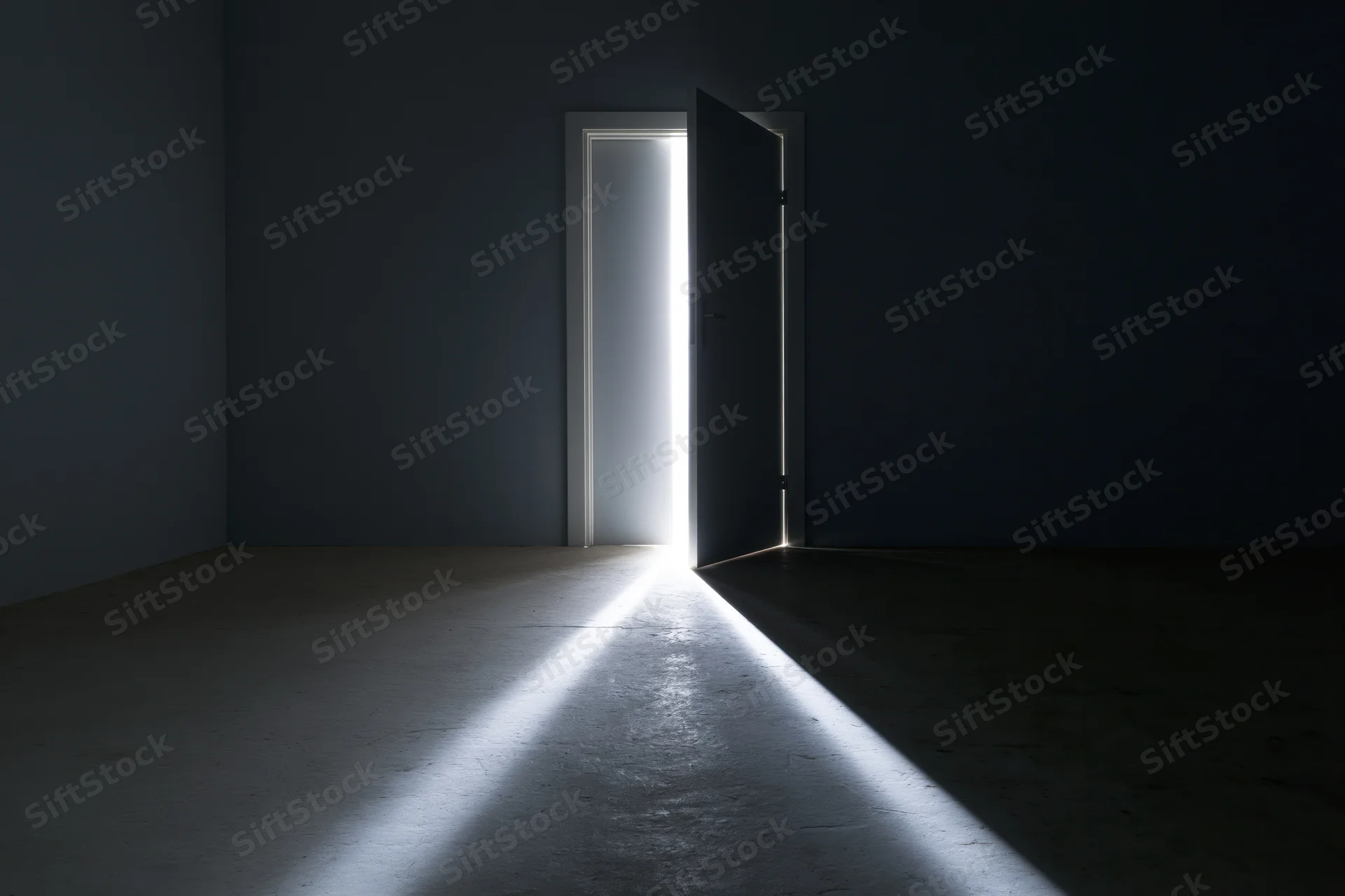 Open door in dark empty room with bright light streaming through doorway