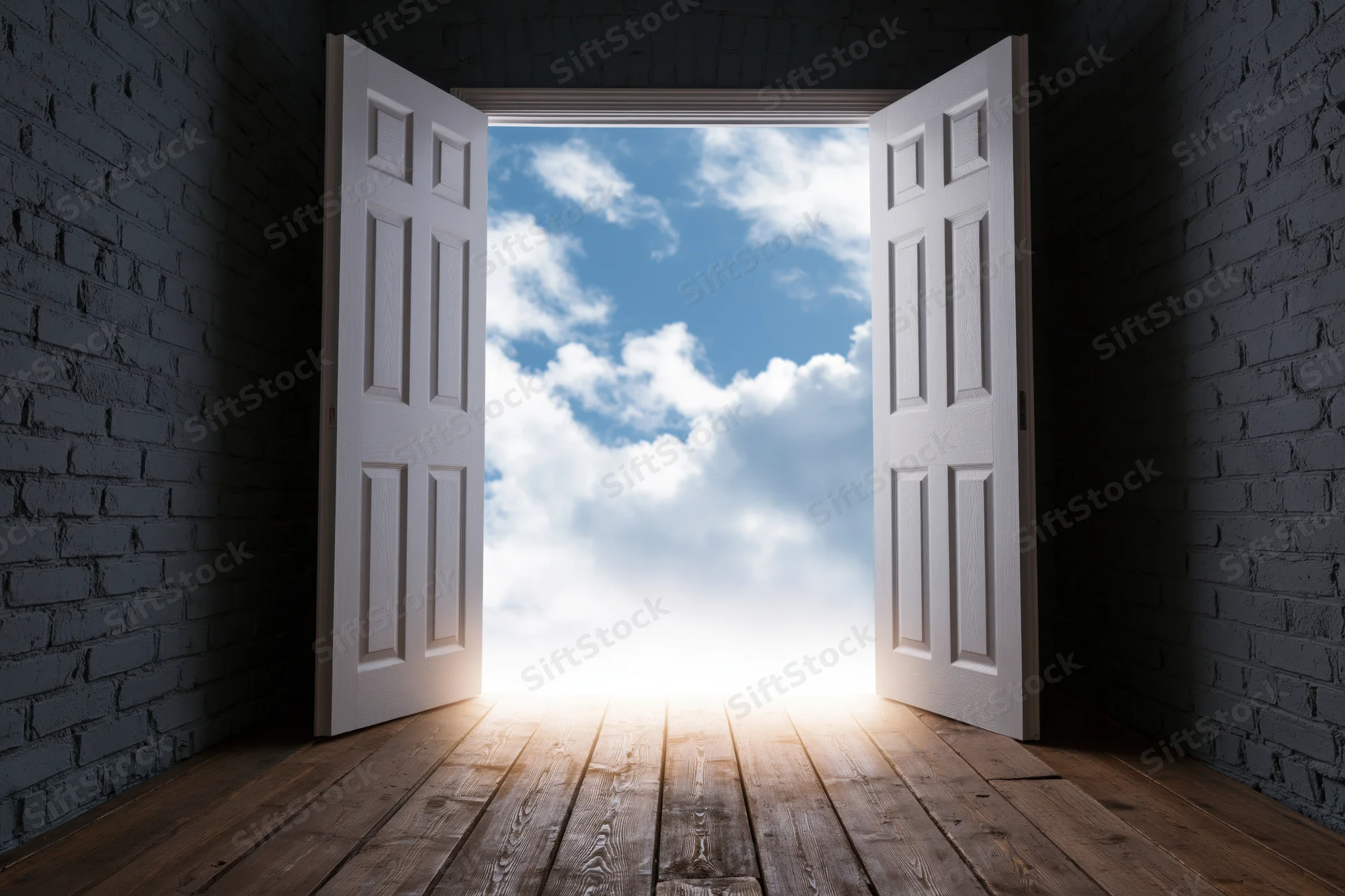 Open white double doors revealing a bright sky and clouds from a dark brick-walled room with wooden floor