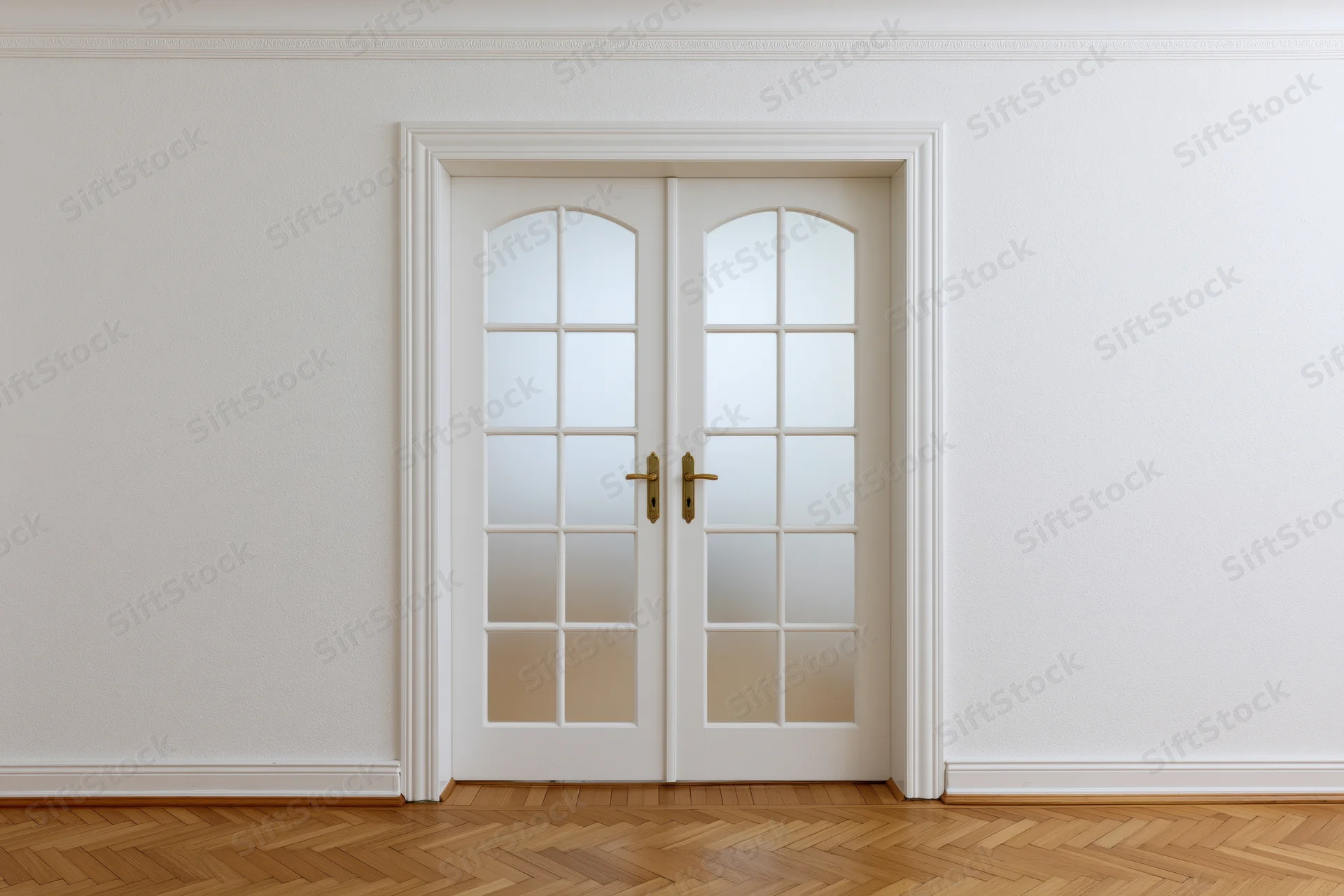 White double doors with arched frosted glass panels in a minimalist interior hallway