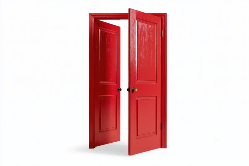 Red wooden interior door half open against white background