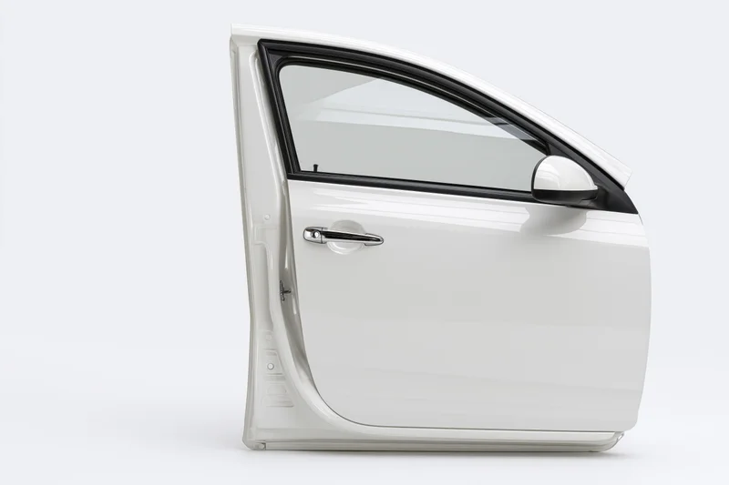 Single white car door detached and standing upright isolated