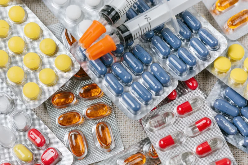 Assorted blister packs of pharmaceutical pills and capsules