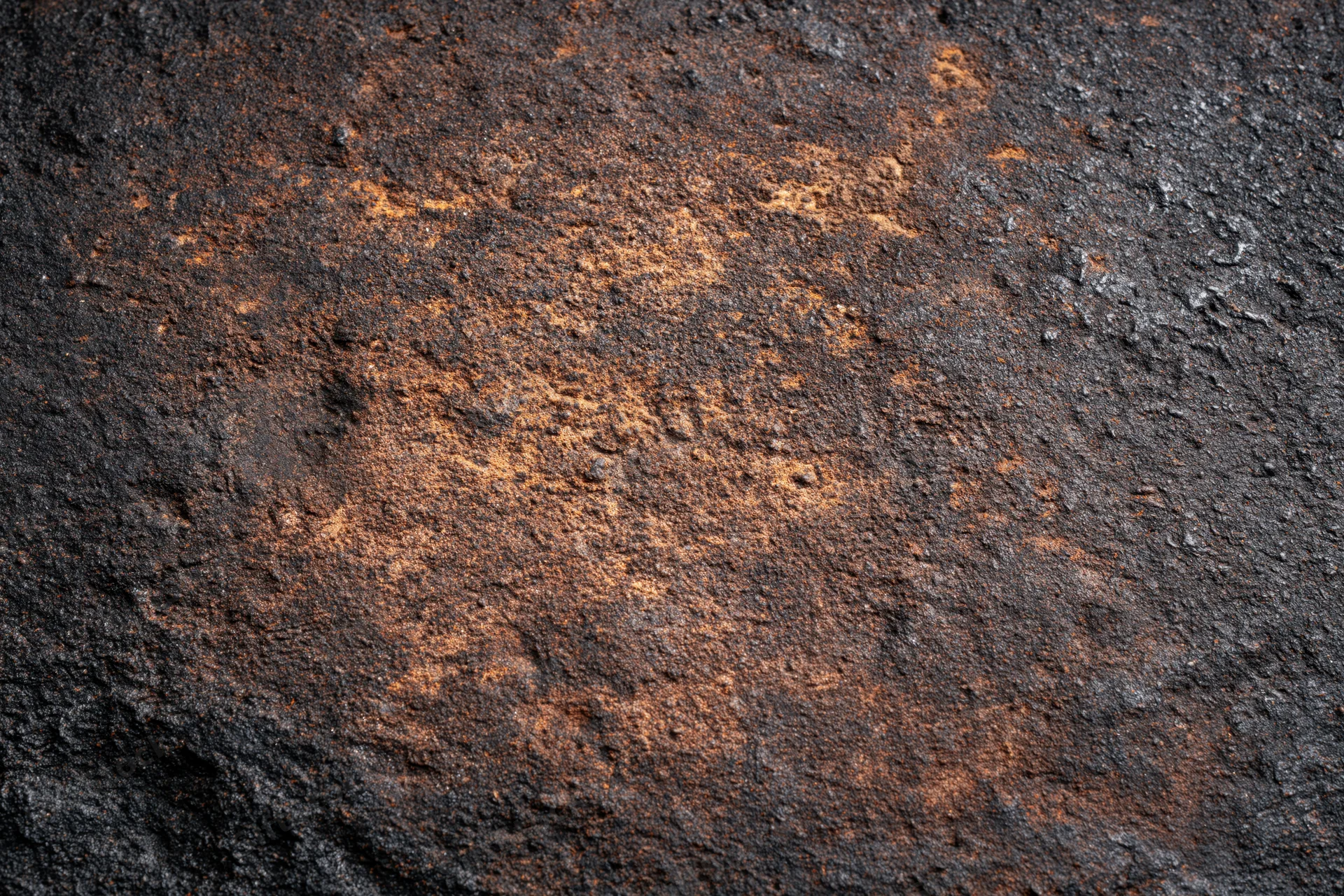 Close-up of heavily oxidized metal surface with rust and corrosion patterns