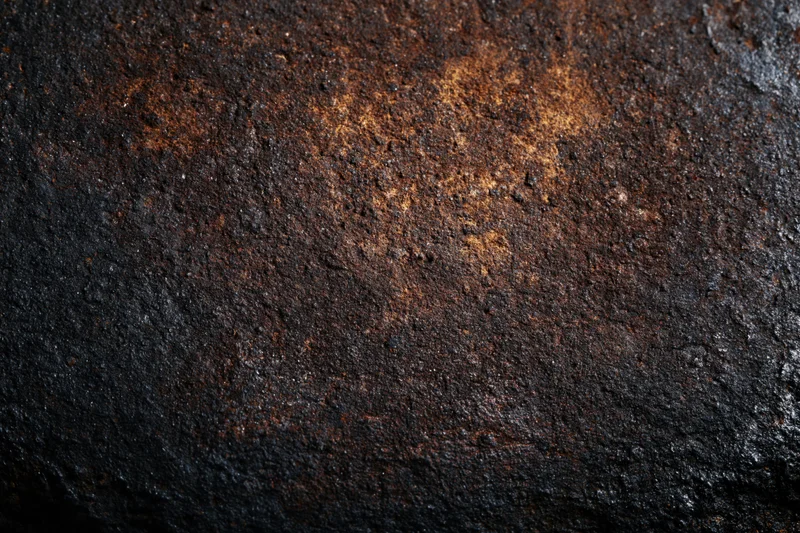 Close-up of heavily oxidized metal surface with rust and corrosion patterns