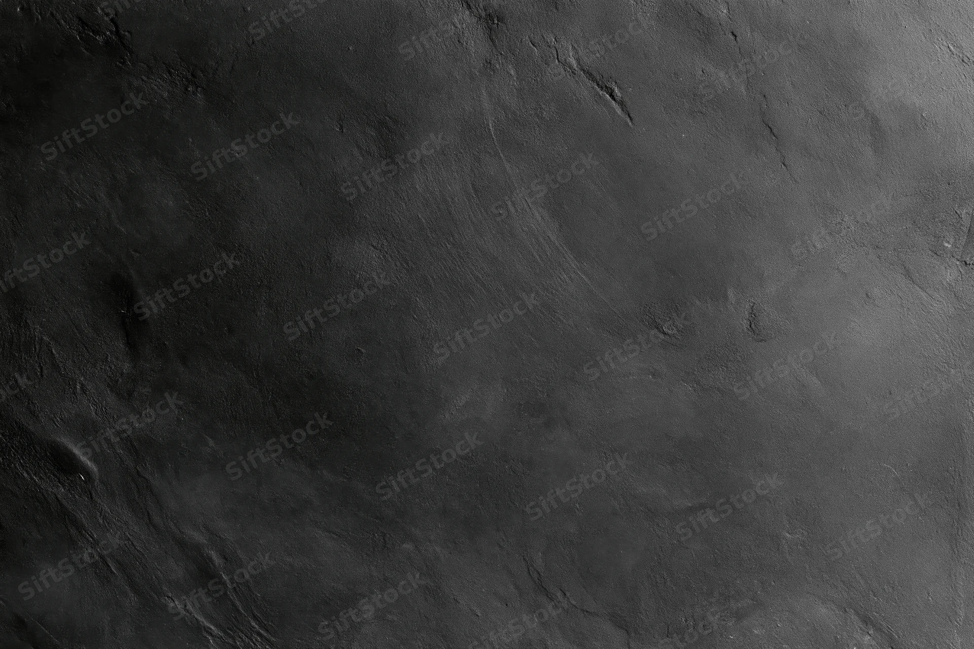 Close-up of rough concrete wall surface with cracks and texture