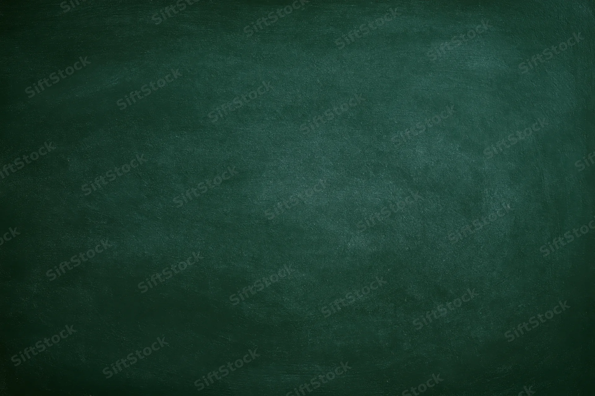 Dark green chalkboard surface filling the frame