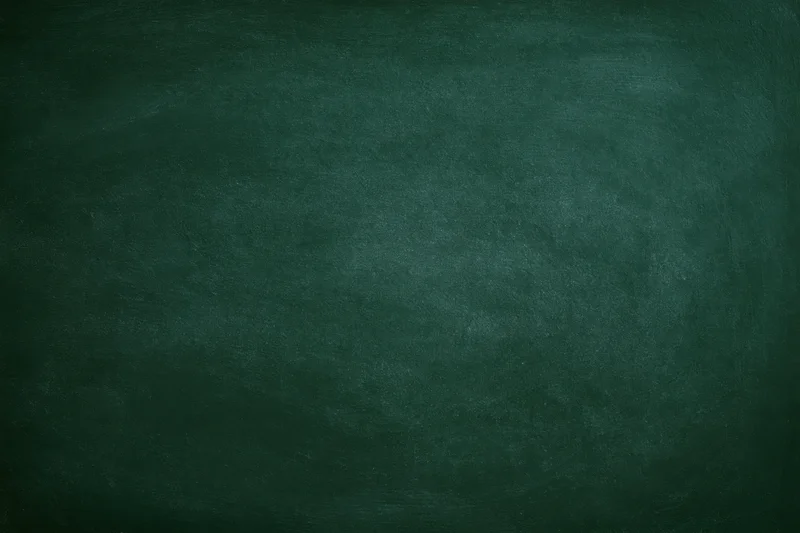 Dark green chalkboard surface filling the frame