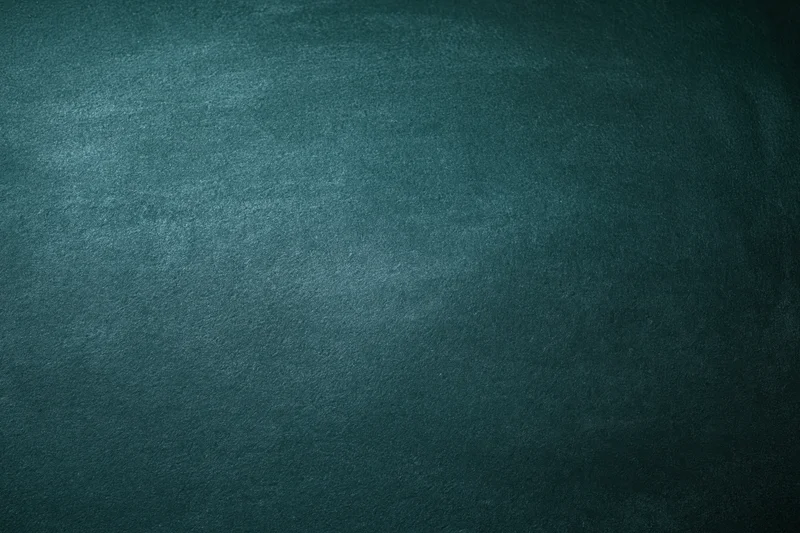 Dark green chalkboard surface filling the frame