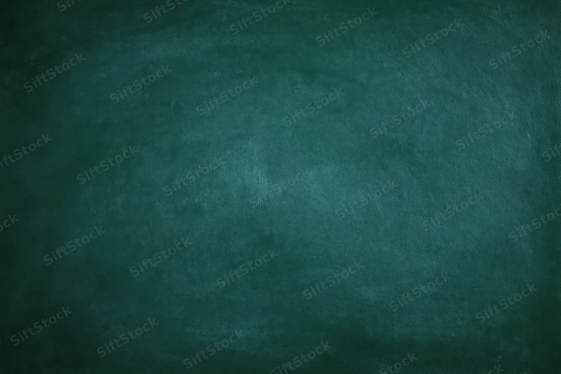 Dark green chalkboard surface filling the frame