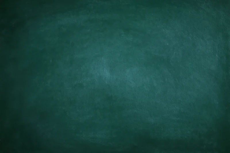 Dark green chalkboard surface filling the frame