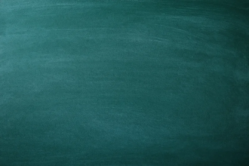 Empty green chalkboard surface filling the frame