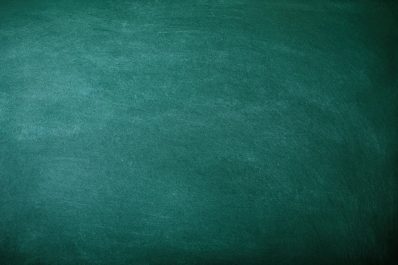 Empty green chalkboard surface filling the frame