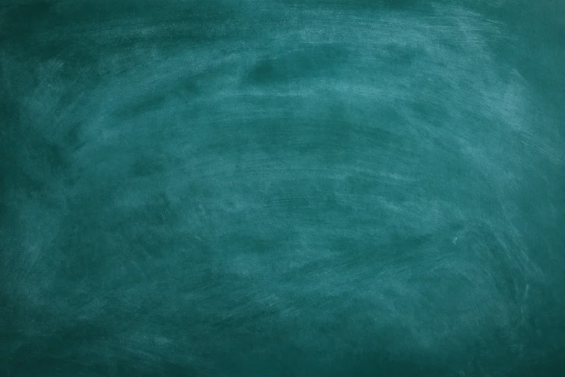 Empty green chalkboard surface filling the frame