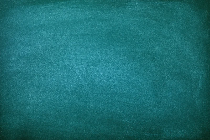 Empty green chalkboard surface filling the frame